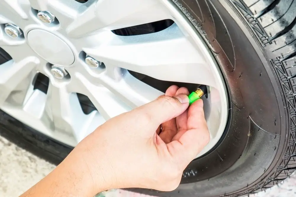 Why do some tires have green valve stem caps?