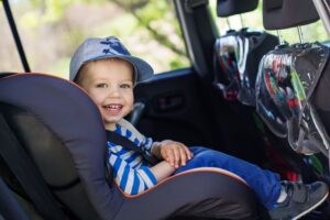Learn how much does your child have to weigh to sit in the front seat in Indiana